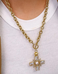 18K Gold Non-Tarnish Pearl Cross Necklace
18K Gold Plating Stainless Steel Faux
Pearl Pendant Size: 2.16" x1.77"
Chain Length: 15.7"
Extension Length: 2.7"
Lead and Nickel Free
Hypoallergenic