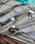 grey crochet bikini bottom with shell sides
resort bikini