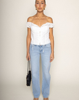white Woven eyelet off the shoulder top
Button down closure
Faux front tie
Unlined
summer top
spring top