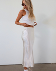 Satin maxi skirt. Elastic waist. Side hook and eye and zipper closures. Unlined. cream maxi skirt. satin maxi skirt. fall outfit.