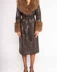brown Midi-length faux leather coat
Straight silhouette with a wrap front
Belt to cinch the waist
Shearling trims the oversized collar and wide cuffs
Button down closure
Lined
leather coat with fur trim
Aspen vibes