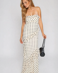 Polka dot printed maxi dress
Tube top
Ruffle on bust trim
Asymmetric ruffle detail on bottom half
Back cut out
Inner rubber grip lining
Side zipper closure
Lined
cream and black polka dot dress
bridal maxi dress