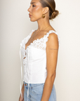white Woven eyelet off the shoulder top
Button down closure
Faux front tie
Unlined
summer top
spring top