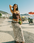 Tiger printed maxi skirt
Crafted from airy bamboo twill
Bias-cut silhouette creates a beautiful fluid drape and playful, bouncy movement
Fit runs true to size