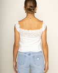 white Woven eyelet off the shoulder top
Button down closure
Faux front tie
Unlined
summer top
spring top