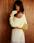 yellow Knit long sleeve cardigan
Rolled collar
Button down closure
Unlined
spring outfit