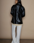 Faux leather blazer. faux leather jacket. Single breast. Collar neckline. Front button down closure. Side pockets. Back slit. Fully lined. black leather jacket. black leather blazer. fall jacket. trendy fall jacket. winter jacket. trendy winter jacket