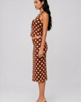 brown and beige Soft mesh polka dot halter top
Fixed neck strap
Adjustable front tie
Lined