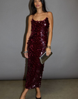 burgundy Sequin maxi dress. Elastic straps. Back hook and eye and zipper closures. Back slit. Fully lined. holiday outfit. holiday dress. holiday inspo