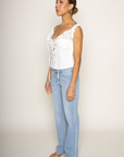 Low rise straight jeans
Zip fly with button closure
5-pocket styling
Intentional fading and light whiskering
Midweight denim fabric