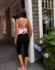 white Open crochet halter top
Adjustable neck tie
Unlined/Sheer
Can also be worn as a skirt
Waist: 28" / Length: 16.5"
Cotton