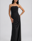 black Strapless maxi dress
Side ruching and draping
Side zipper closure
Lined