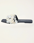 Natural shell-embellished slide sandals
Flat sole
Square toe
Delicate stitching detail
