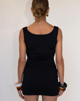 black Sleeveless knit dress
Pictured worn both ways
Fixed straps
Open back
Elastic sides and back waistband
Unlined