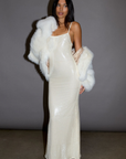 white Sequin knit maxi dress. cream Sequin knit maxi dress. Adjustable straps. Side hook and eye and zipper closures. Fully lined. holiday look. holiday outfit. christmas outfit. new years outfit