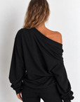 black Oversized hoodie sweatshirt
Fold over neckline
Front pocket
Unlined
can be worn multiple ways