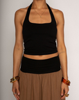 Knit crop top. Elastic halter neckline. Partially lined. going out top. black halter crop top