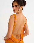 orange Floral printed maxi dress
Cowl neck
Open back with cowl
Adjustable ties at lower back for waist snatching
Mermaid hem
wedding guest dress