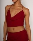 Halter crop top. Adjustable neck and back tie strap. Cowl neck. Partially lined. Maxi skirt. Hidden side zipper. Lined. red skirt set. cherry red skirt set. going out set. nice dinner set. summer outfit. spring outfit.