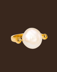 Gold ring with a large pearl
18K Gold Non-Tarnish Baroque Pearl Ring
18K Gold Plating
Stainless Steel
Faux Pearl
Size 7 Measurement: 0.682 Diameter/2.14 Circumference
Lead-free
Nickel-safe
Hypoallergenic
Water Resistant