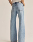 High rise straight, full-length leg jean
Crafted from rigid denim, this style will naturally soften and relax with wear
Size 26 measurements:
Rise: 11.5" / Leg Opening: 22" / Inseam: 33"
Cotton
blue denim jeans