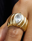 18K Gold Non-Tarnish Marquise
CZ Statement Ring
18K Gold Plating
Stainless Steel
Cubic Zirconia
