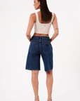 Mid rise jorts shorts
Relaxed and wide leg design
Button fly
Rigid denim does require some time to 'wear in'