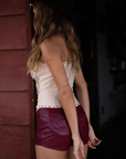 Embroidered knit corset
Adjustable halter tie neck
Front lace up closure
Back hook and eye and zipper closures
Fully lined
Studded details
Coachella outfit
Stagecoach outfit
Festival Outfit