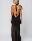 Polka dot halter maxi dress
V-neckline
Adjustable neck tie
Low back
Asymmetrical sheer hemline
Partially unlined/Sheer
black and white polka dot maxi dress