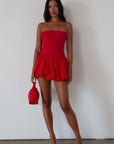 Sleeveless dress. Knit bodice. Woven bubble skirt. Elastic hem. Fully lined. red bubble dress. red mini dress. red mini bubble dress. summer dress. going out dress