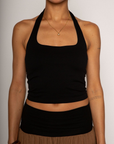 Knit crop top. Elastic halter neckline. Partially lined. going out top. black halter crop top