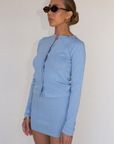 blue knit cardigan and mini skirt set
summer knit set
spring knit set