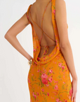 orange Floral printed maxi dress
Cowl neck
Open back with cowl
Adjustable ties at lower back for waist snatching
Mermaid hem
wedding guest dress