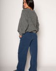 Knit sweatpants. Elastic waistband with drawstring closure. Side pockets. Unlined. blue denim sweatpants. cute loungewear.