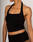 Knit crop top. Elastic halter neckline. Partially lined. going out top. black halter crop top