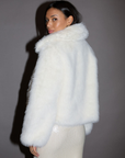 Faux fur coat. Collar neckline. Open front. Side pockets. Fully lined. white fur coat. white faux fur coat. holiday look. holiday inspo. holiday outfit