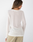 white Sheer long sleeve top
Crewneck
Unlined/Sheer
going out top