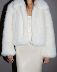 Faux fur coat. Collar neckline. Open front. Side pockets. Fully lined. white fur coat. white faux fur coat. holiday look. holiday inspo. holiday outfit