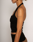 Knit crop top. Elastic halter neckline. Partially lined. going out top. black halter crop top