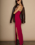 Knit maxi dress. Strapless neckline. Ruched front. Side slit. Partially lined. red strapless maxi dress. holiday maxi dress. holiday look.