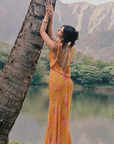 orange Floral printed maxi dress
Cowl neck
Open back with cowl
Adjustable ties at lower back for waist snatching
Mermaid hem
wedding guest dress