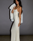 white Sequin knit maxi dress. cream Sequin knit maxi dress. Adjustable straps. Side hook and eye and zipper closures. Fully lined. holiday look. holiday outfit. christmas outfit. new years outfit