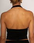 Knit crop top. Elastic halter neckline. Partially lined. going out top. black halter crop top