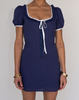 blue Short sleeve mini dress
Front and sleeve tie
Hook eye front closure
Contrast trim stitching
Back smocking
Side zipper
Lined
summer mini dress
spring mini dress