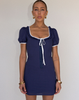 blue Short sleeve mini dress
Front and sleeve tie
Hook eye front closure
Contrast trim stitching
Back smocking
Side zipper
Lined
summer mini dress
spring mini dress