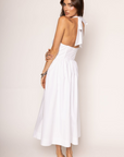 Woven midi dress
Adjustable halter neckline
Boning in bodice
Side pockets
Elastic back neckline
Back hook and eye and zipper closures
Fully lined
white midi dress
bridal dress
bridal shower dress