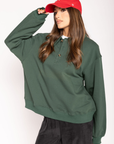 Knit sweater top
Collar neckline
Front button down closure
Unlined
hunter green sweater