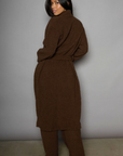 Faux sherpa longline cardigan. Long sleeves. Open front. Tie waist. Unlined. teddy bear sherpa robe cardigan. cozy lounge outfit. fall outfit. winter outfit. lazy at home outfit