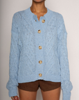 BLUE Chunky cable knit cardigan
Front button down closure
Unlined