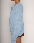 BLUE Chunky cable knit cardigan
Front button down closure
Unlined